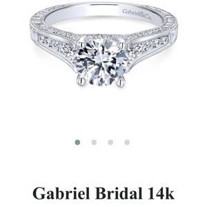 Gabriel and Co. matching engagement setting and wedding band